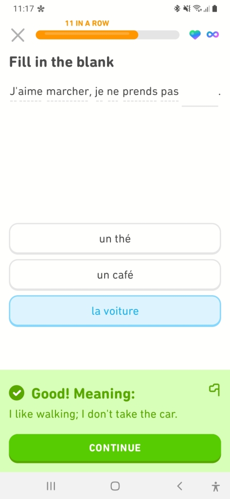Screenshot from Duolingo, translation from French to English is: I like walking; I don't take the car.